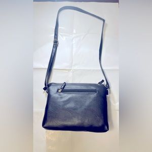Brand new women’s  black vegan leather.